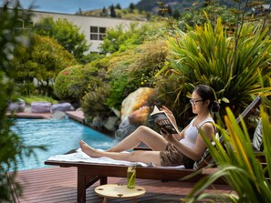 Outdoor pool, open 7:00 AM to 10:00 PM, pool umbrellas, pool loungers