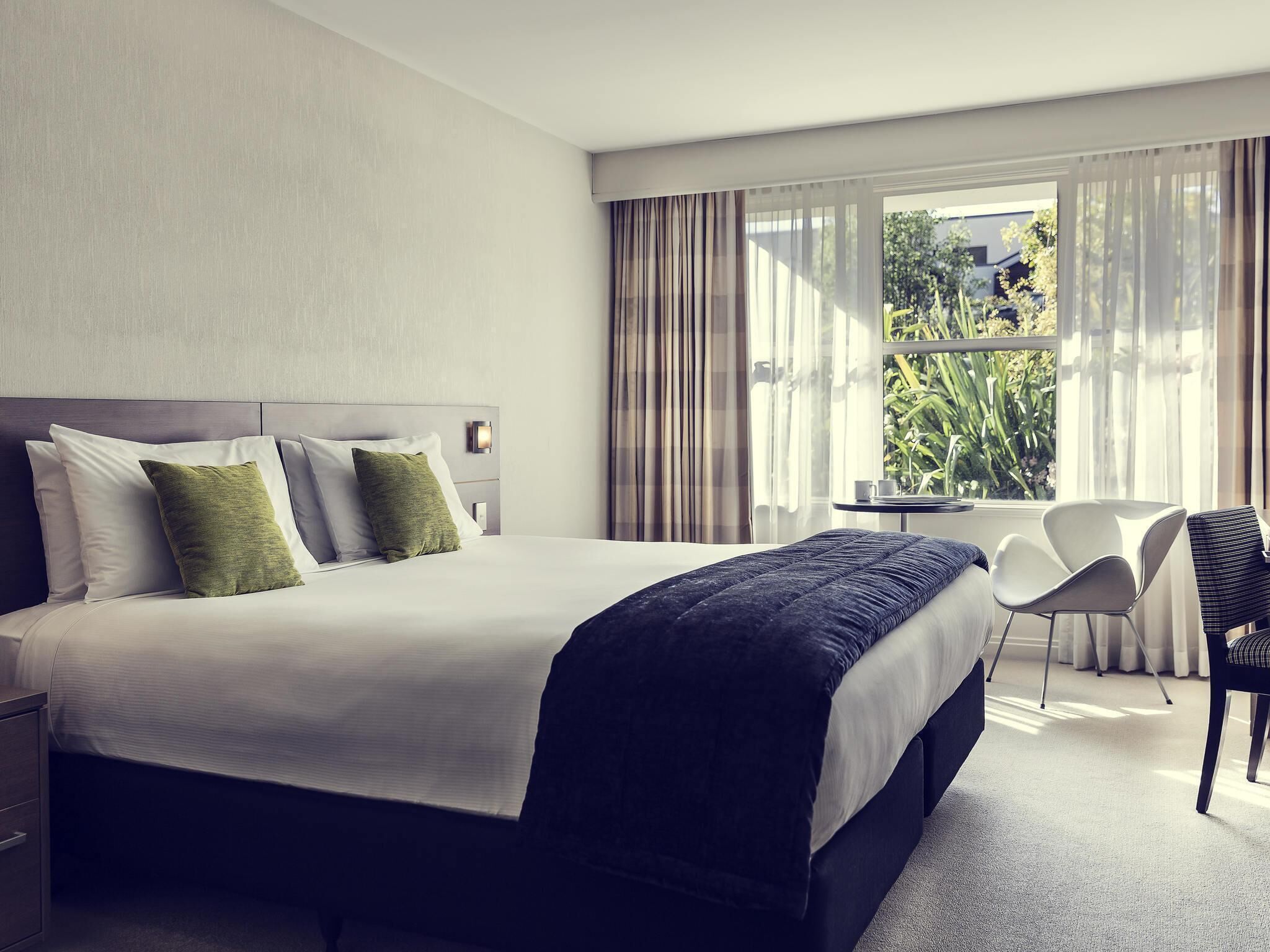 Room, 1 King Bed, Garden View | In-room safe, individually furnished, desk, blackout drapes