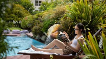 Outdoor pool, open 7:00 AM to 10:00 PM, pool umbrellas, sun loungers