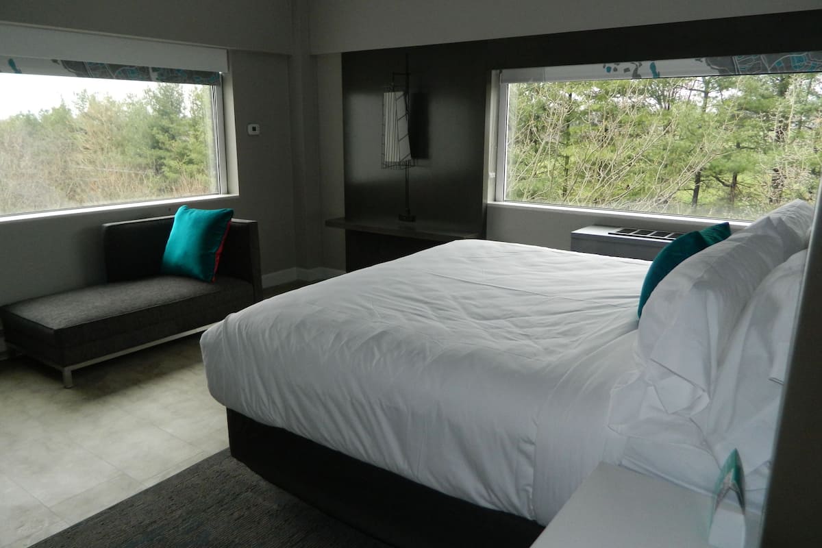 premium bedding, tempur-pedic beds, blackout curtains, soundproofing