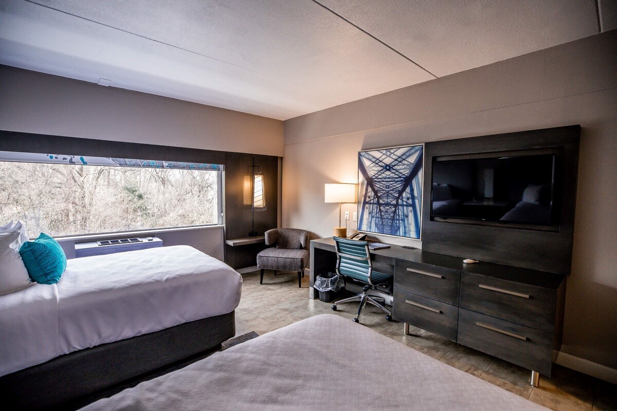 Premium bedding, Tempur-Pedic beds, blackout drapes, soundproofing