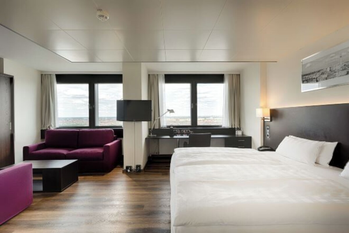Hypo-allergenic bedding available, in-room safe, desk, laptop workspace