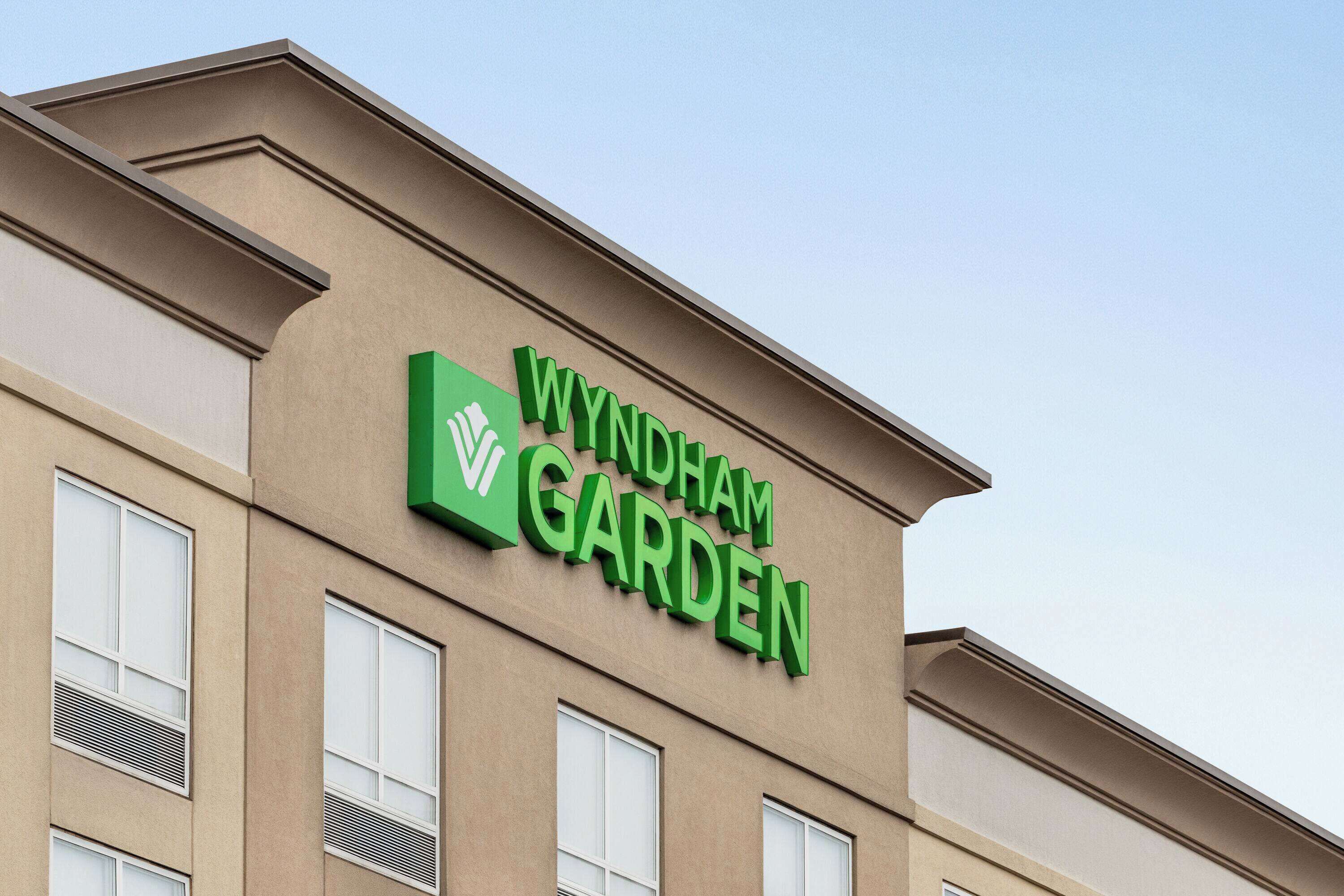 A building with a sign reading "Wyndham Garden".