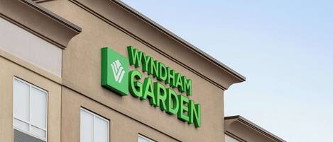 A building with a sign reading "Wyndham Garden".