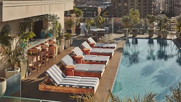 Indoor pool, outdoor pool, open 7:00 AM to 7:00 PM, free pool cabanas