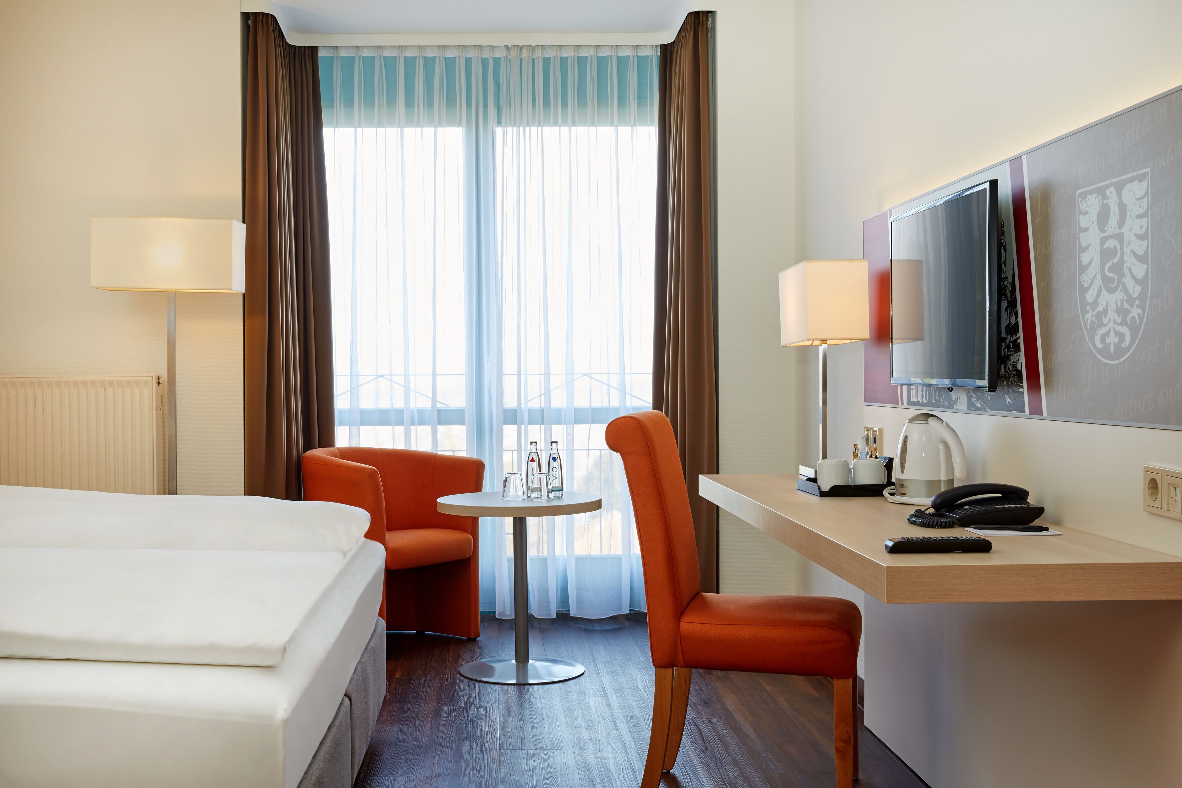 comfort double room, city view | desk, iron/ironing board, free wifi, bed sheets