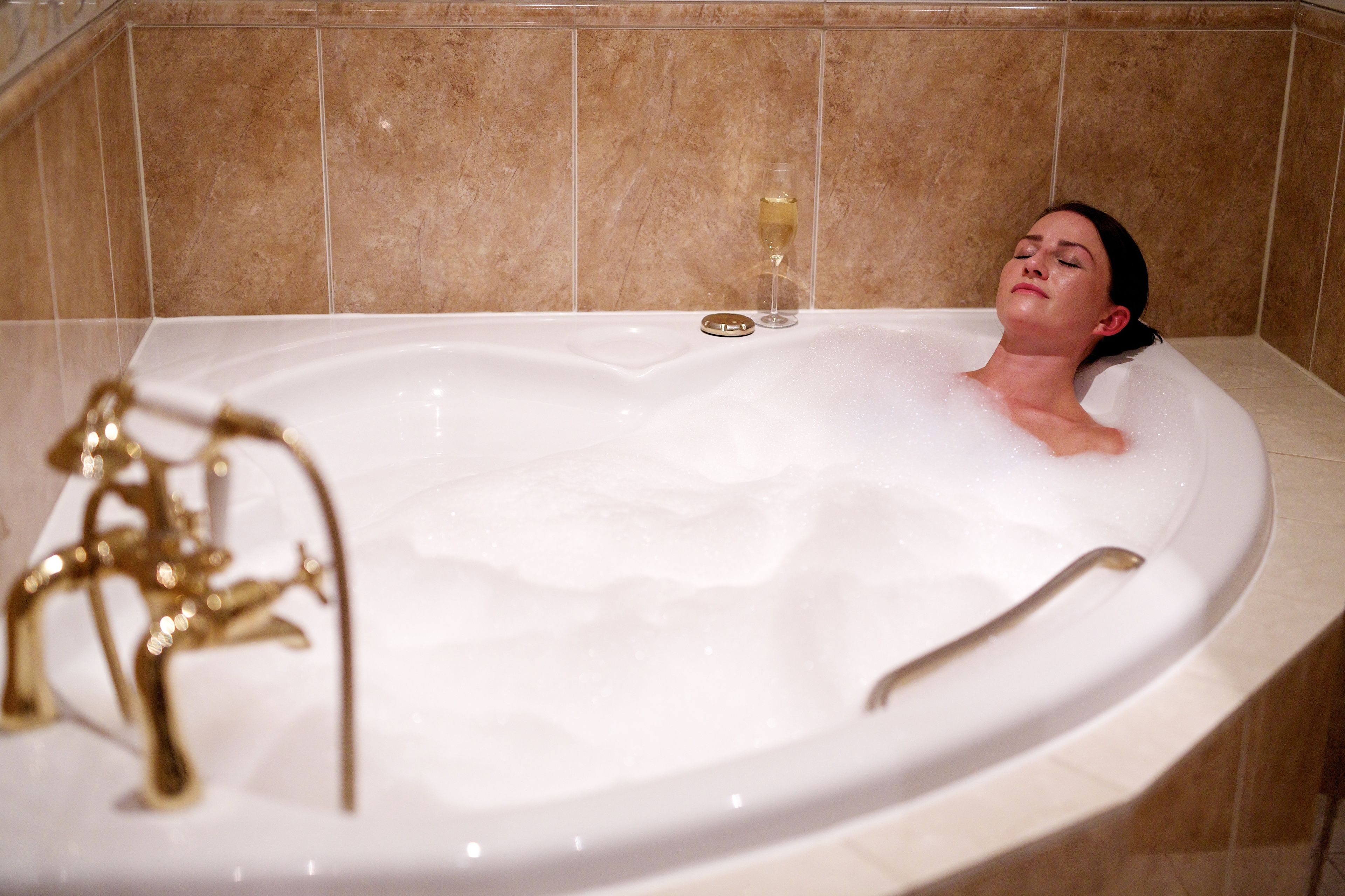 combined shower/bathtub, eco-friendly toiletries, hair dryer, bathrobes