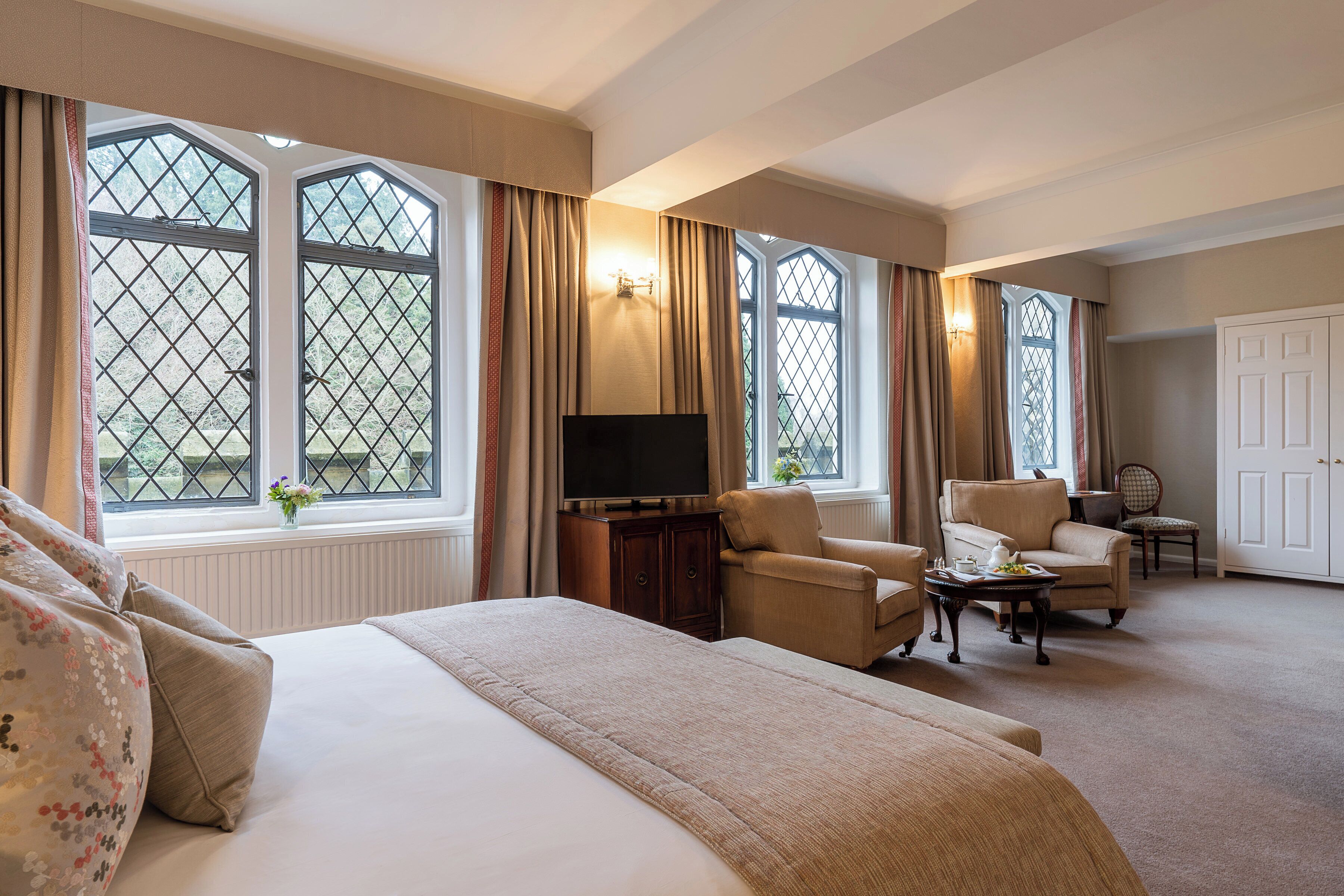 junior suite | in-room safe, individually decorated, desk, blackout curtains