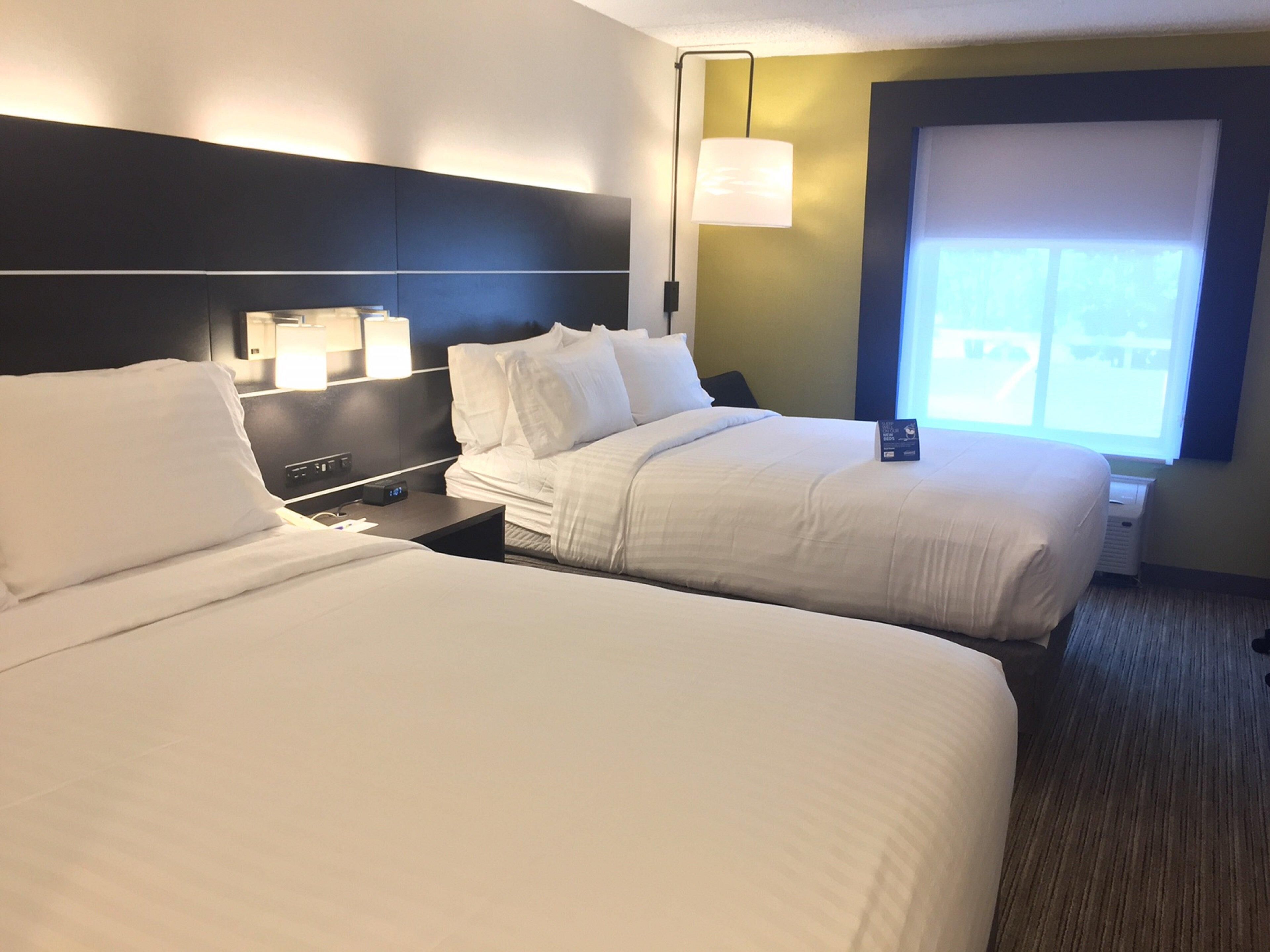 Premium bedding, down comforters, memory foam beds, in-room safe