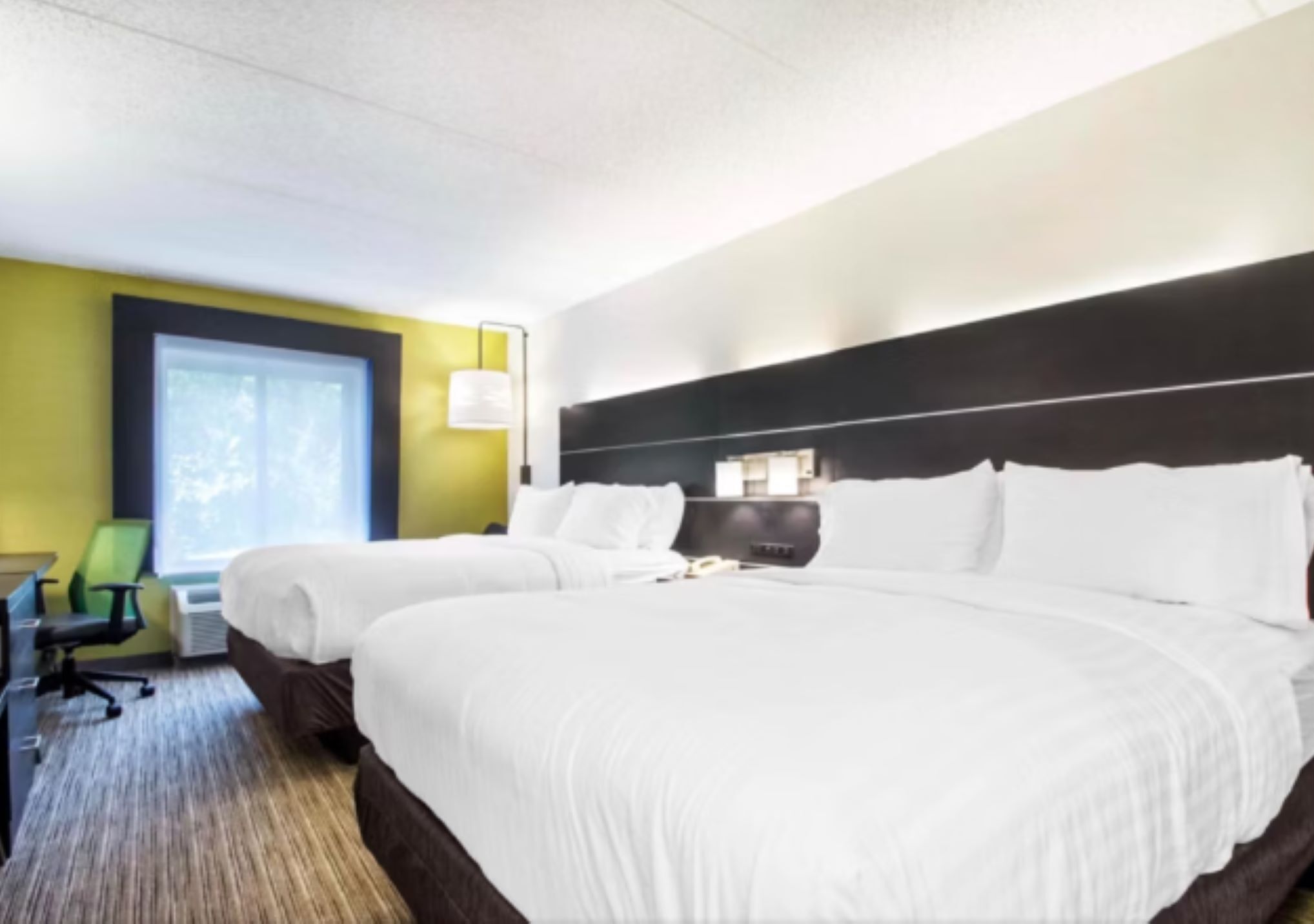 Premium bedding, down comforters, memory foam beds, in-room safe