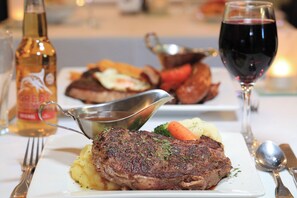 Breakfast and dinner served, local cuisine