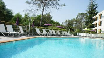 Outdoor pool, open 9:30 AM to 7:30 PM, pool loungers