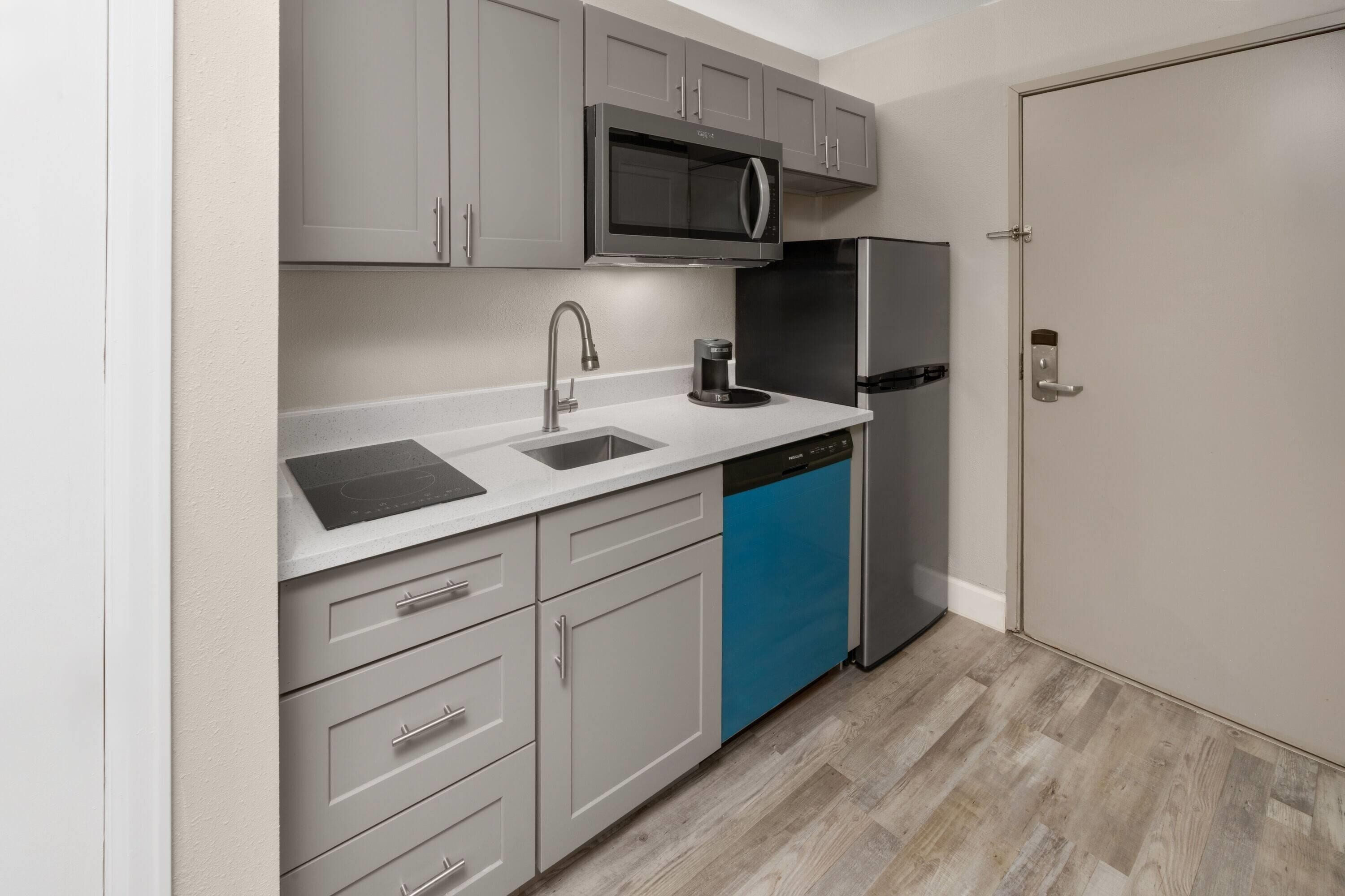 2 queen beds, non smoking, kitchenette | premium bedding, desk, blackout curtains, iron/ironing board