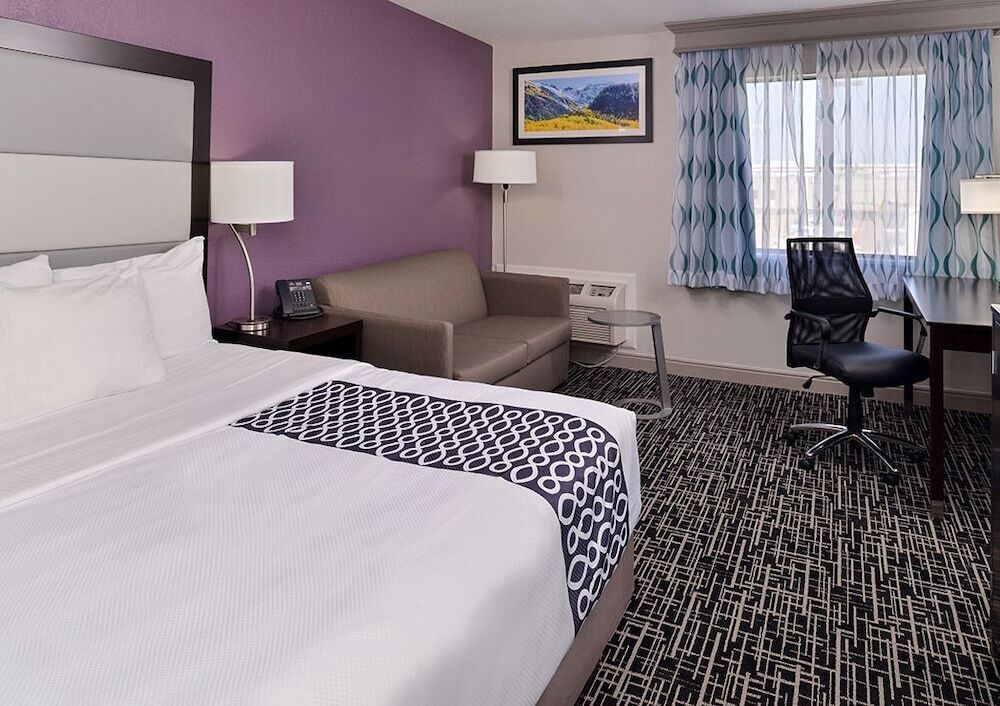 Premium bedding, desk, blackout drapes, iron/ironing board