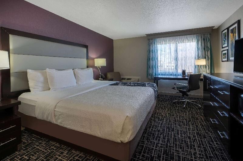 Premium bedding, desk, blackout drapes, iron/ironing board