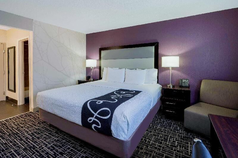 Premium bedding, desk, blackout drapes, iron/ironing board