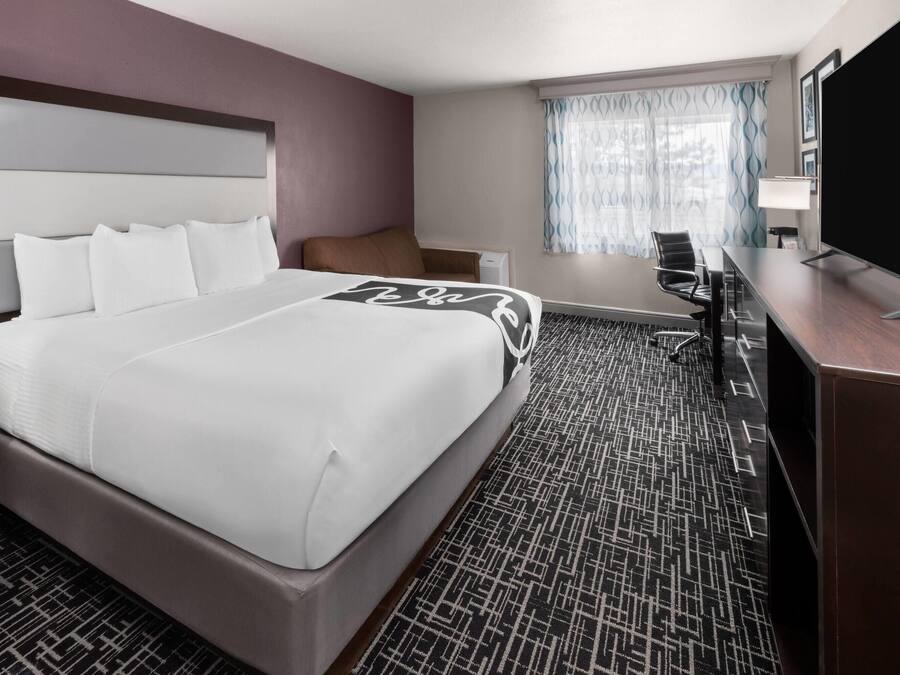 Premium bedding, desk, blackout drapes, iron/ironing board