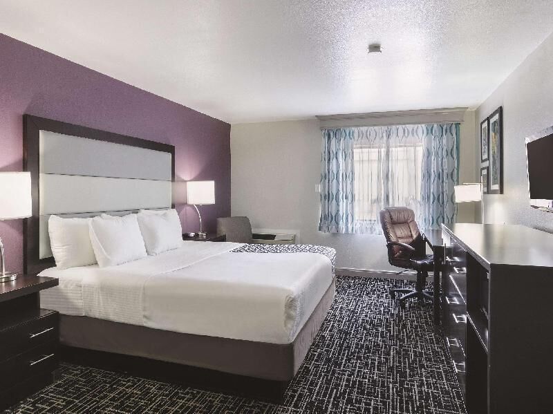 Premium bedding, desk, blackout drapes, iron/ironing board