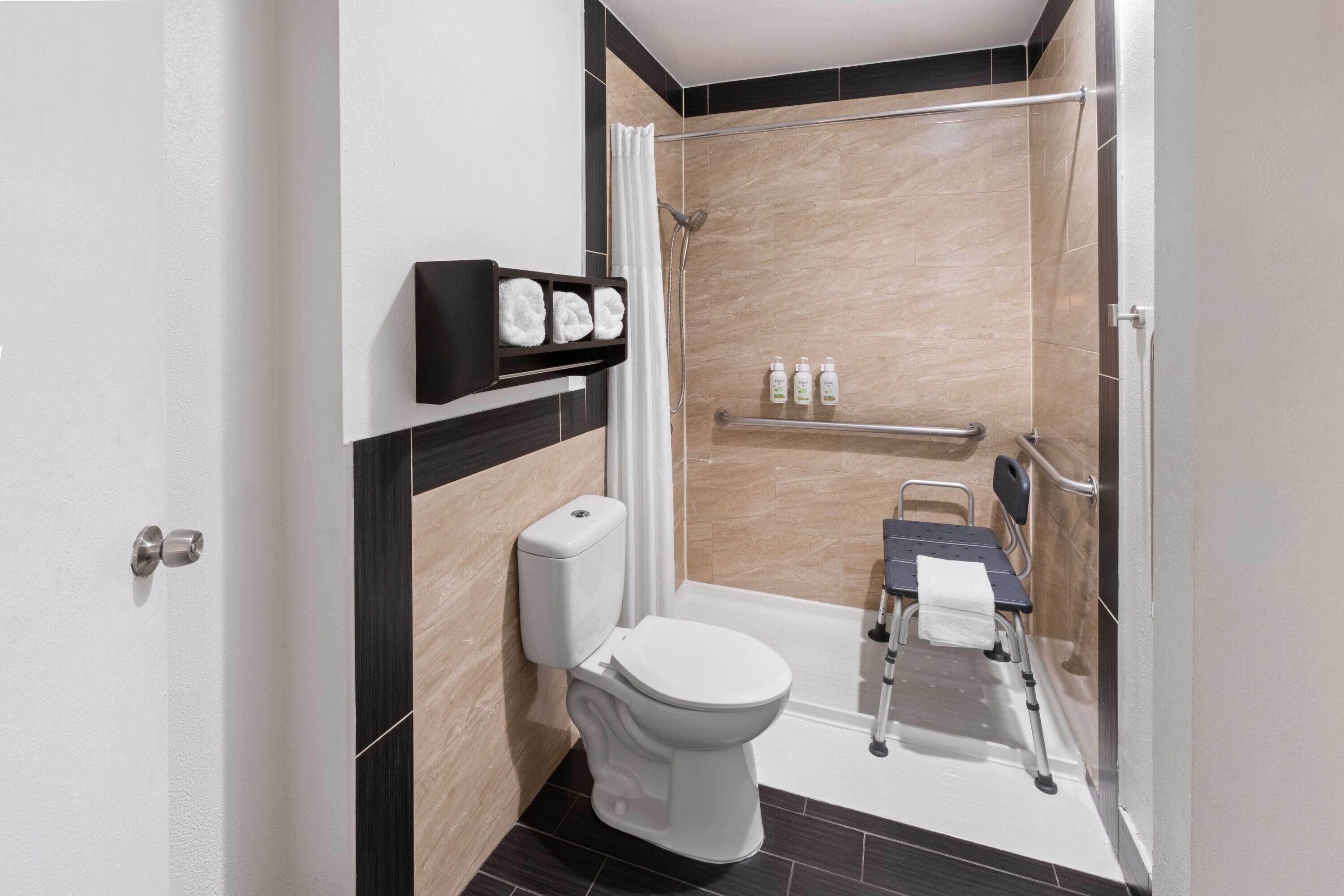 king bed, accessible, refrigerator & microwave | accessible bathroom