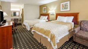A hotel room with two beds, a desk, a chair, a television, and artwork on the walls. - Days Inn by Wyndham Kent - Akron (Kent)