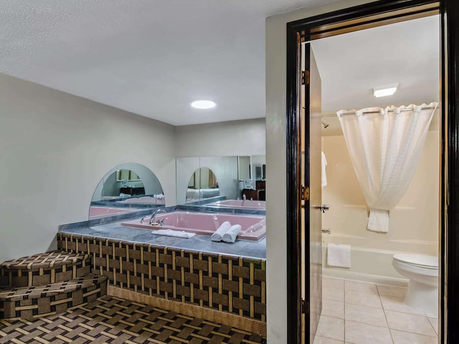 Premium bedding, down duvets, Select Comfort beds, in-room safe
