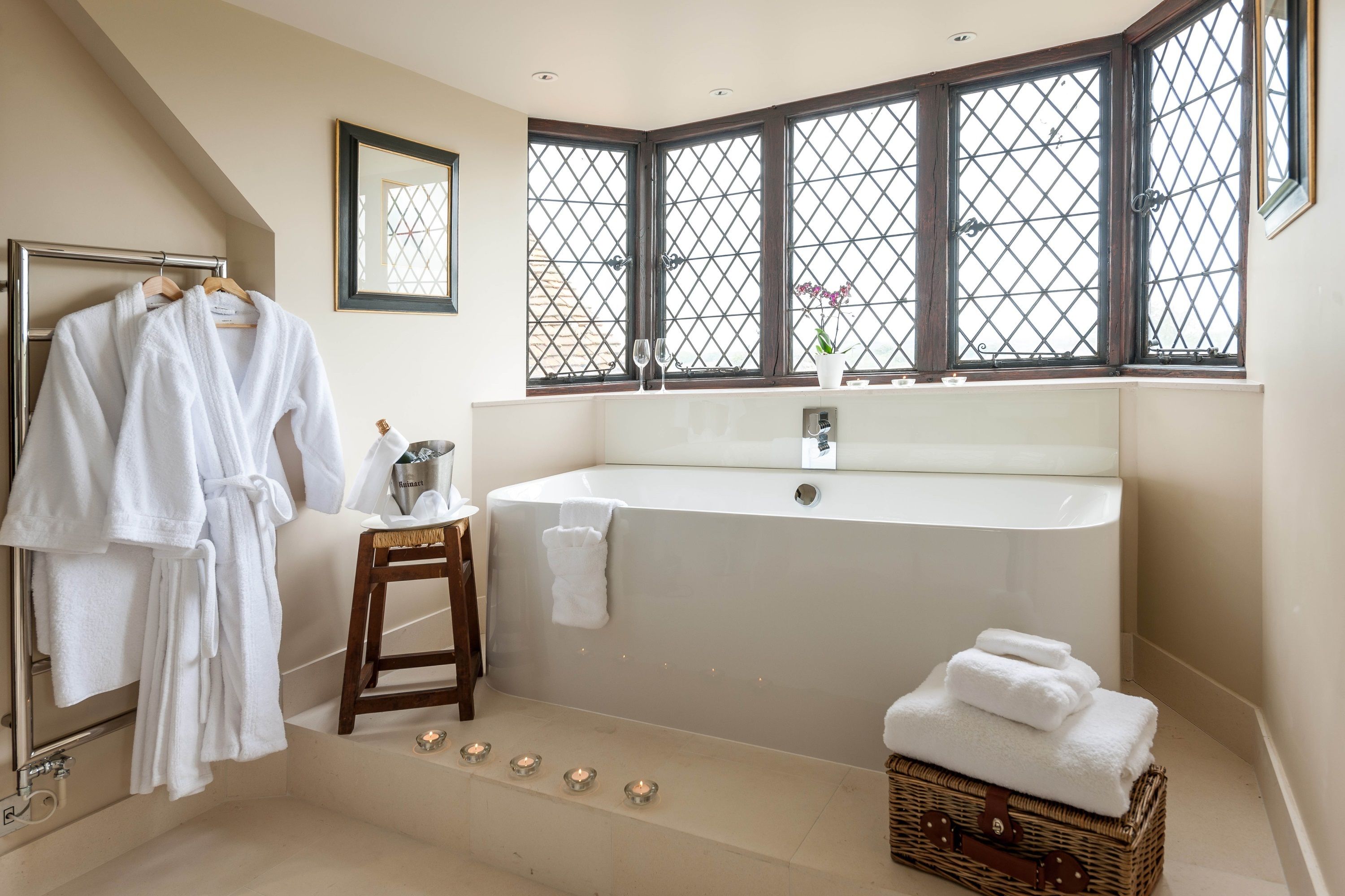 premier deluxe | bathroom | designer toiletries, hair dryer, bathrobes, towels