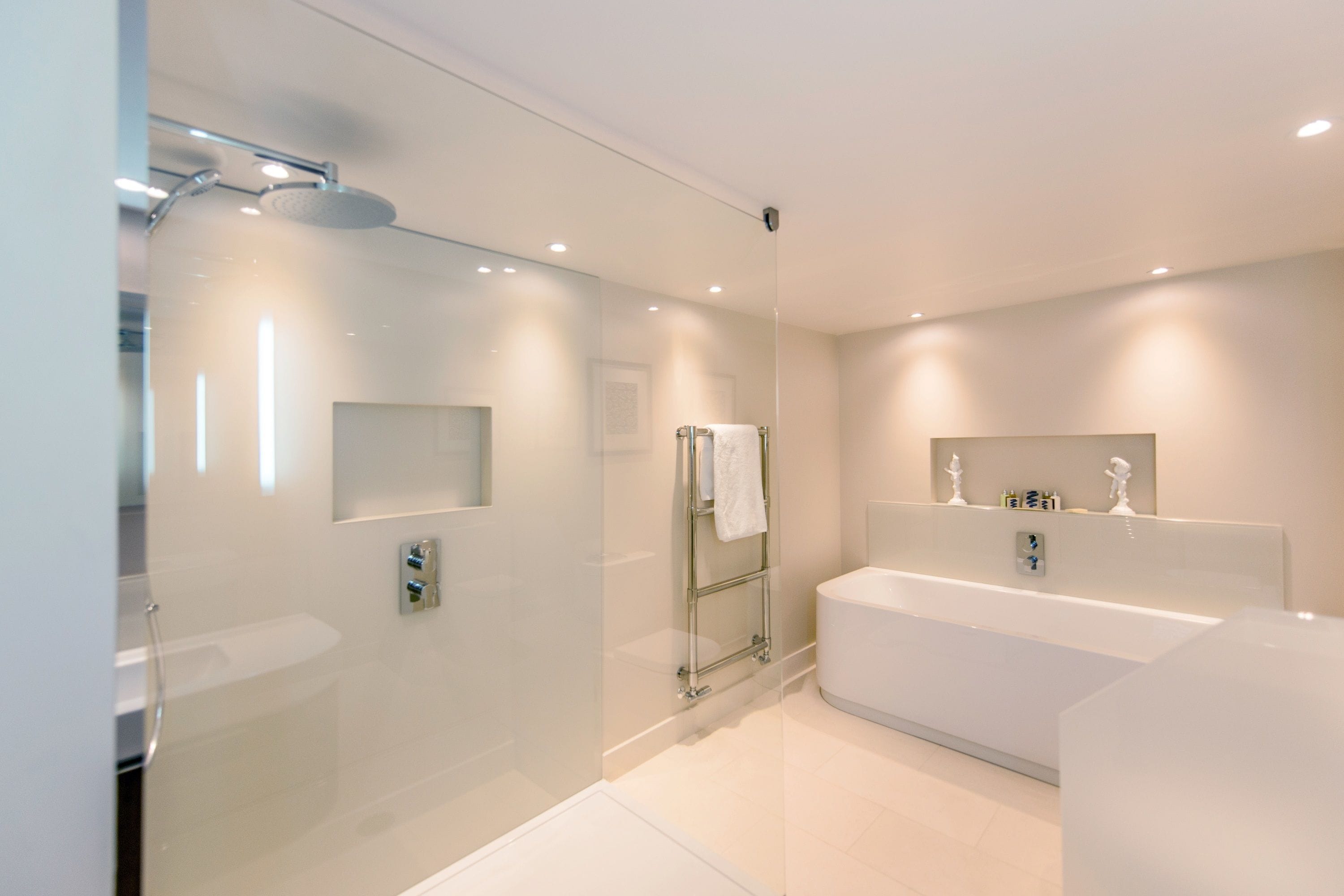 junior deluxe | bathroom | designer toiletries, hair dryer, bathrobes, towels