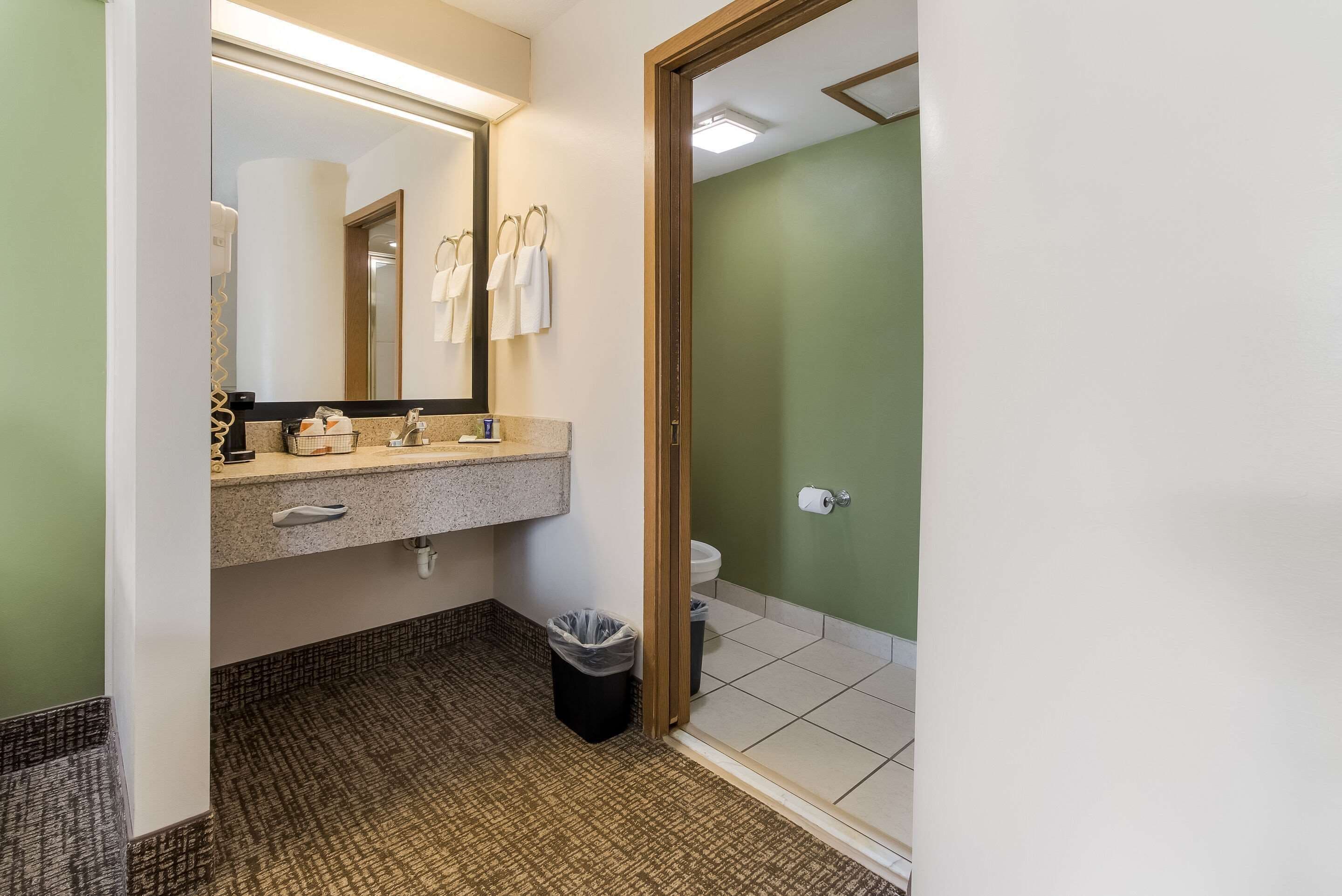 standard room, 2 queen beds, non smoking | bathroom | free toiletries, hair dryer, towels