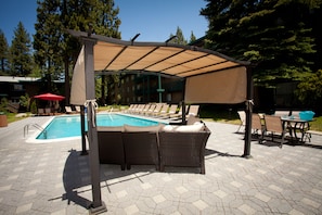 Outdoor pool, pool umbrellas, sun loungers