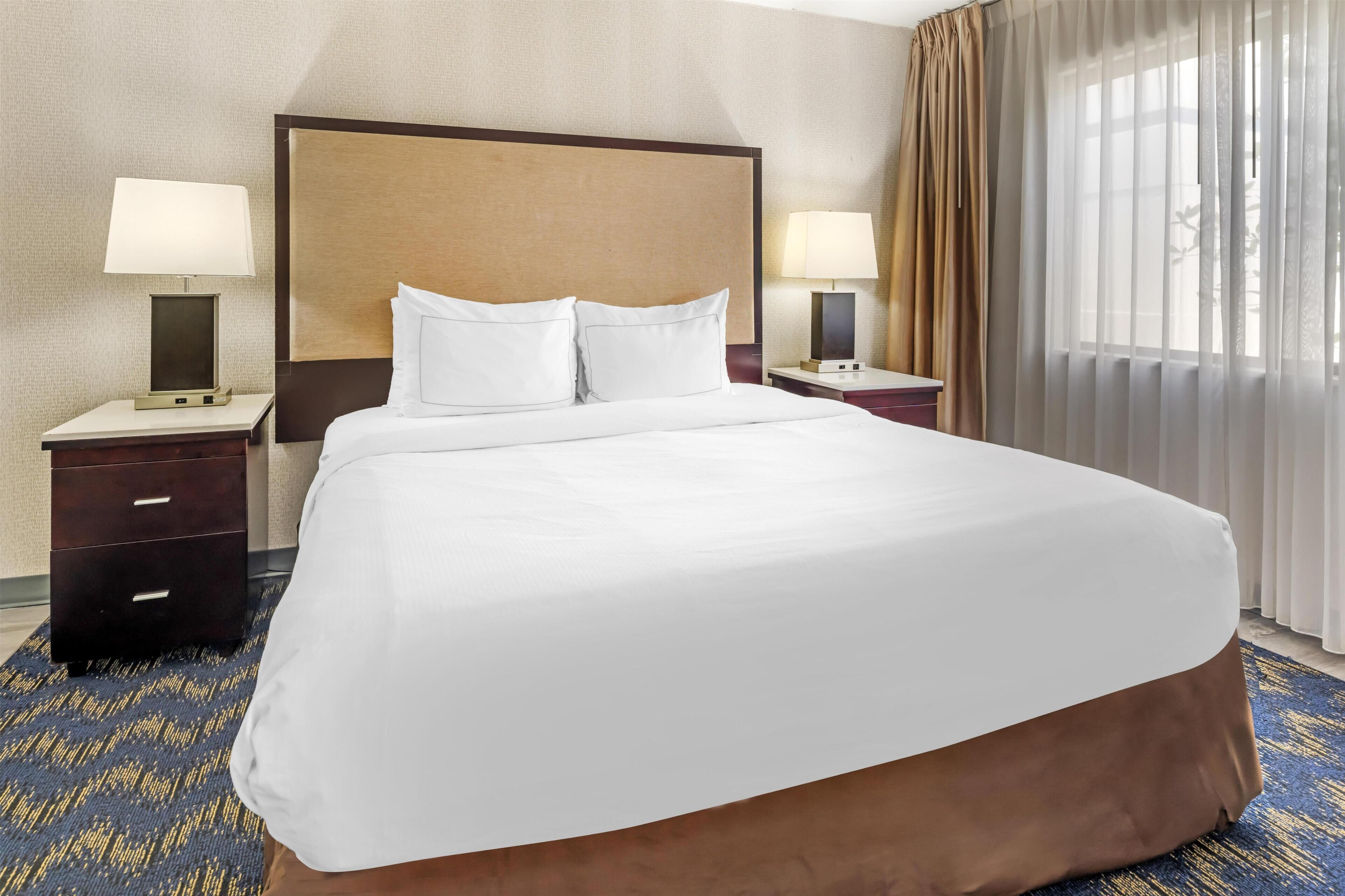 Hypo-allergenic bedding, in-room safe, desk, laptop workspace