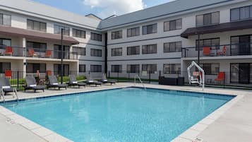 Seasonal outdoor pool, pool loungers