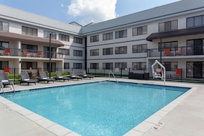 Seasonal outdoor pool, pool loungers