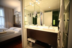 Separate bathtub and shower, rainfall showerhead, designer toiletries