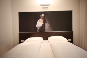 Premium bedding, down duvets, pillow-top beds, minibar