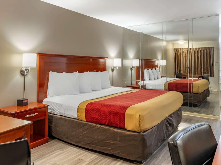 Desk, iron/ironing board, free cribs/infant beds, rollaway beds