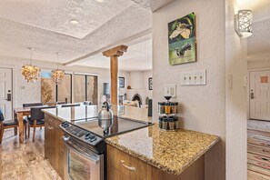 3-Bedroom Condominium | Private kitchen | Fridge, microwave, oven, stovetop