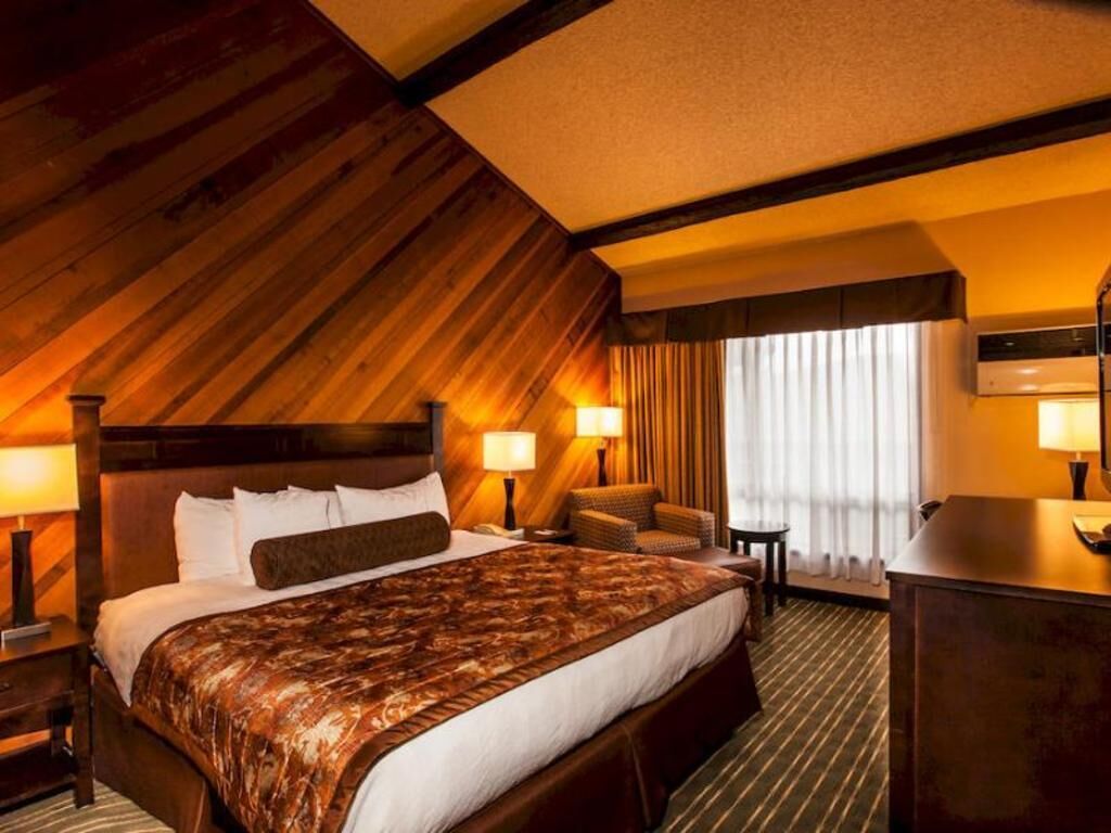Premium bedding, pillow-top beds, desk, laptop workspace