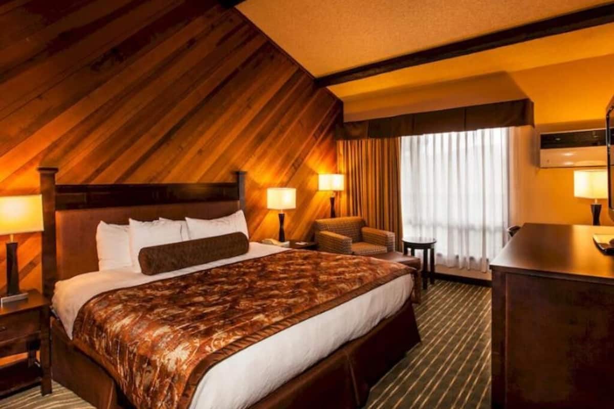 Premium bedding, pillow-top beds, desk, laptop workspace