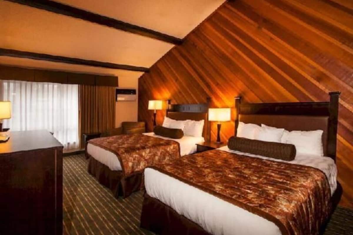 Premium bedding, pillow-top beds, desk, laptop workspace