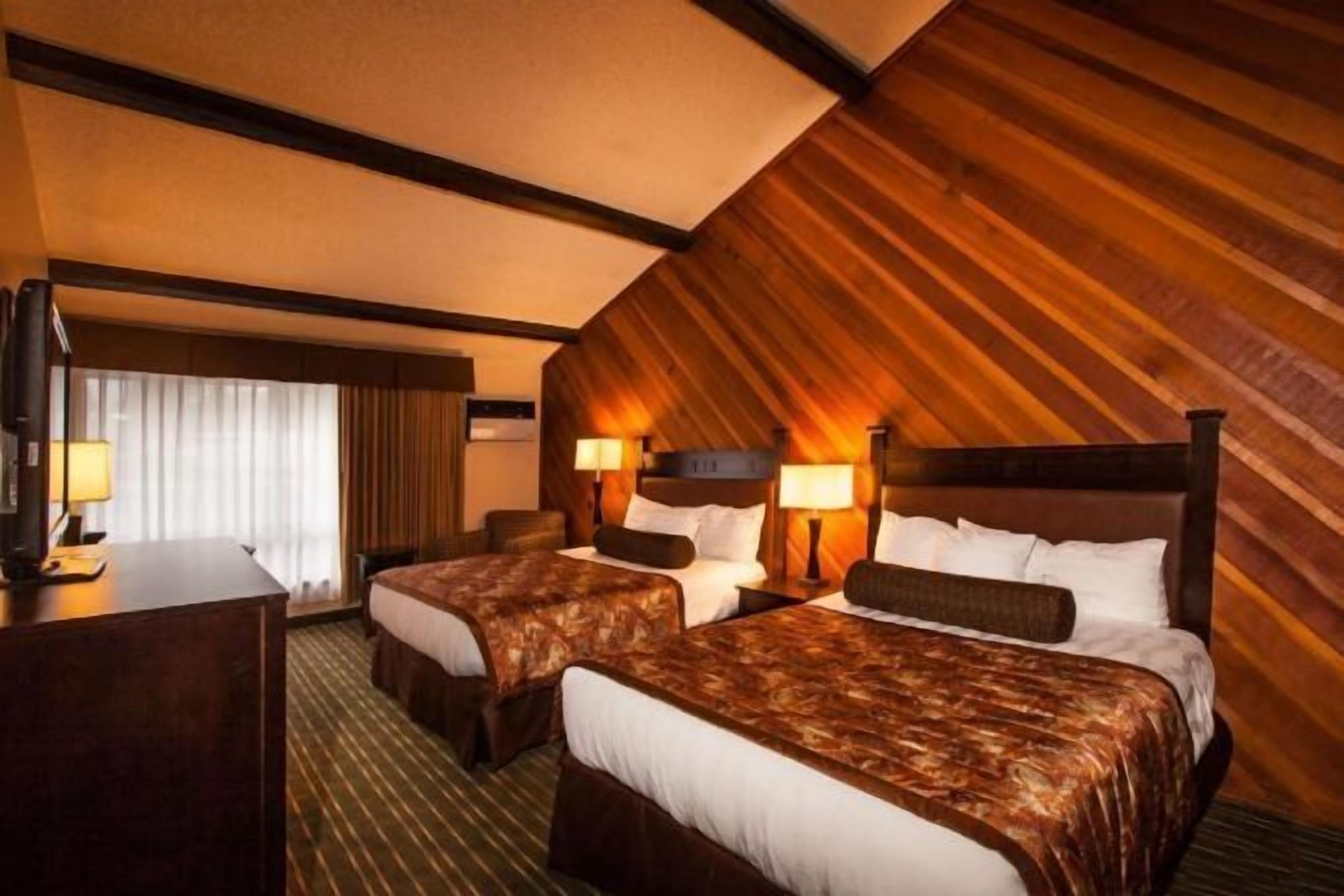 Premium bedding, pillowtop beds, desk, laptop workspace