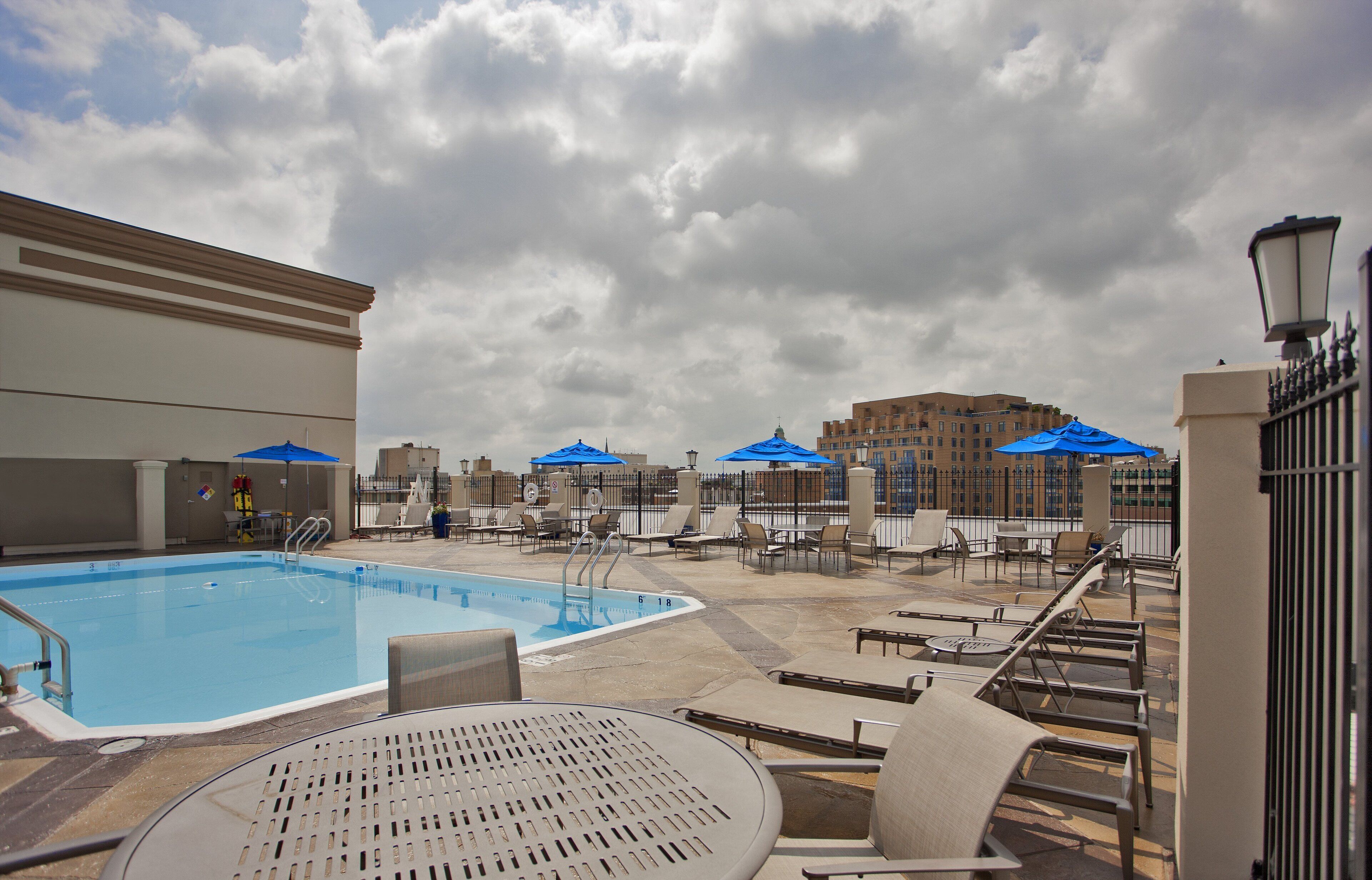 seasonal outdoor pool, open 10:00 am to 8:00 pm, pool loungers