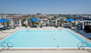 Seasonal outdoor pool, open 10:00 AM to 8:00 PM, sun loungers