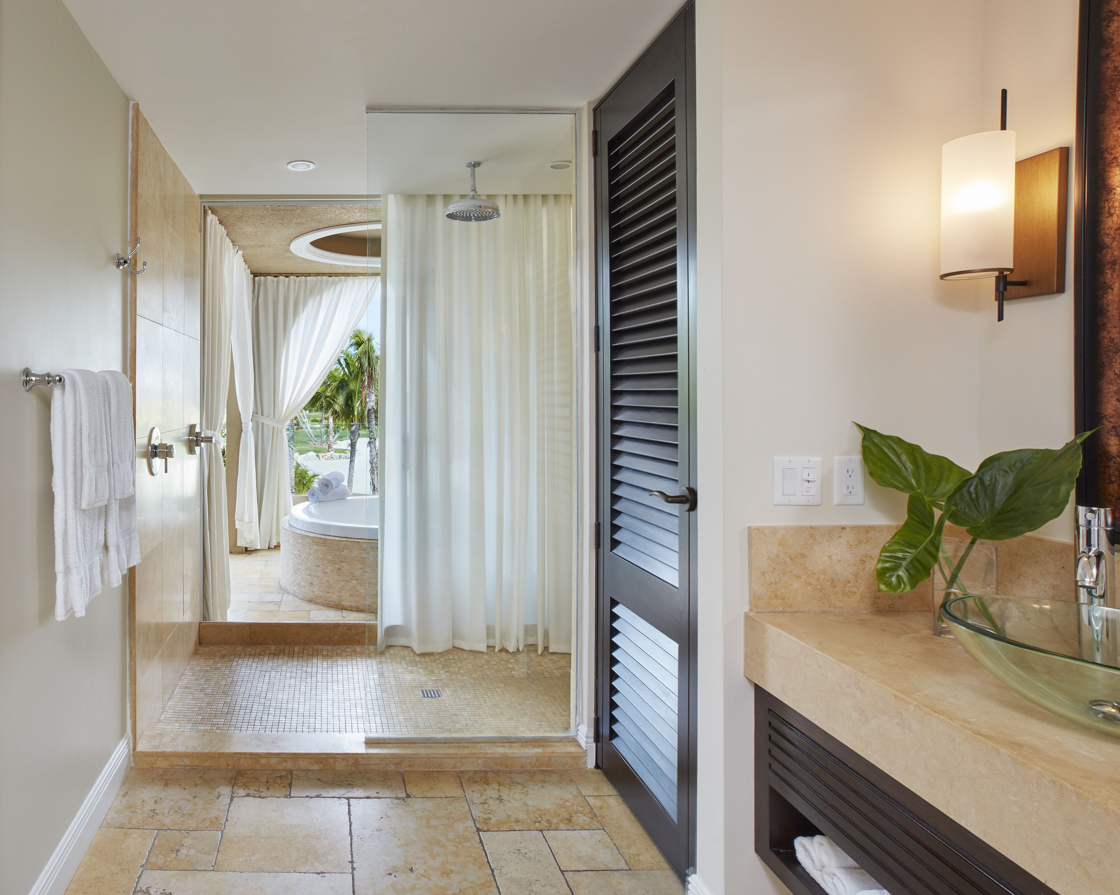 designer toiletries, hair dryer, bathrobes, slippers