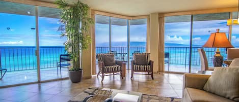 Condo, 2 Bedrooms, 2 Bathrooms, Oceanfront (Unit 1110) | Living area | 65-inch Smart TV with cable channels
