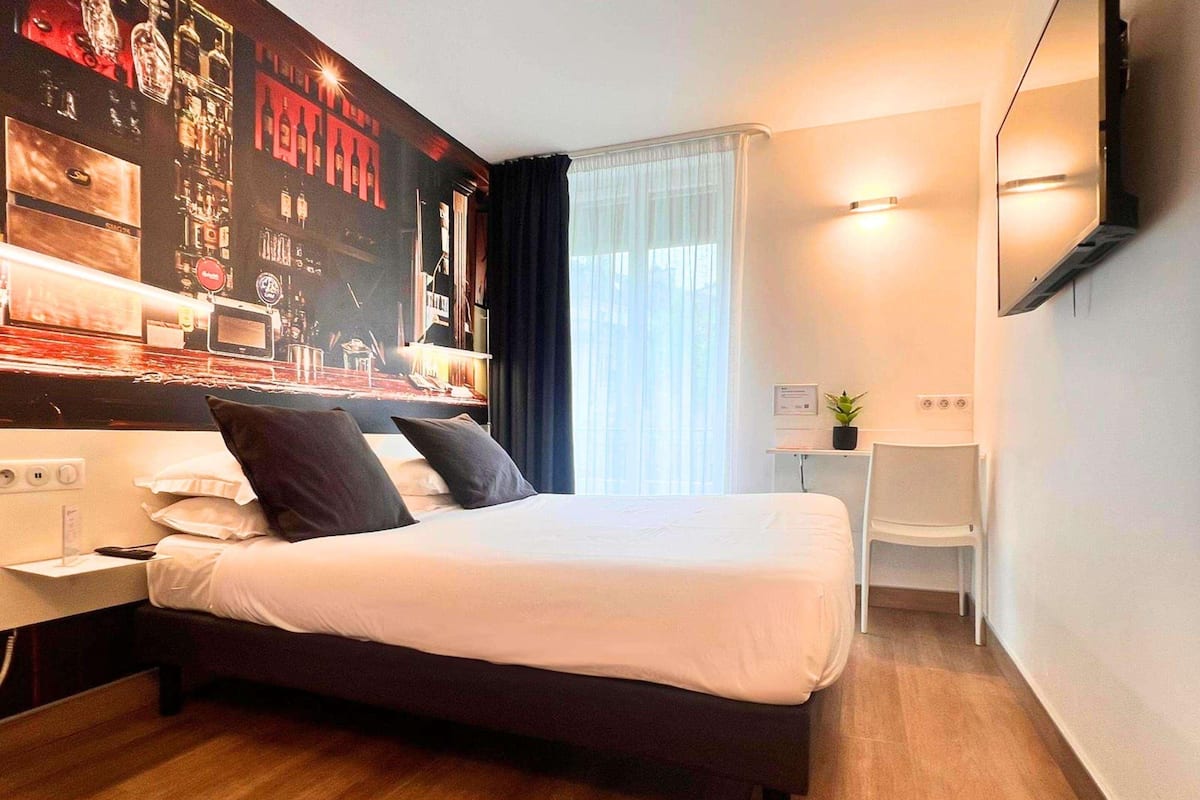 Ropa de cama de alta calidad y minibar