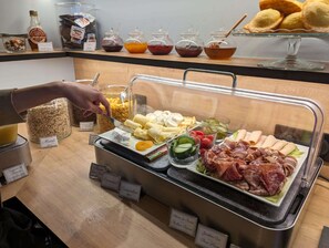 Daily buffet breakfast (EUR 15 per person)