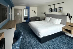 Premium bedding, desk, laptop workspace, blackout curtains