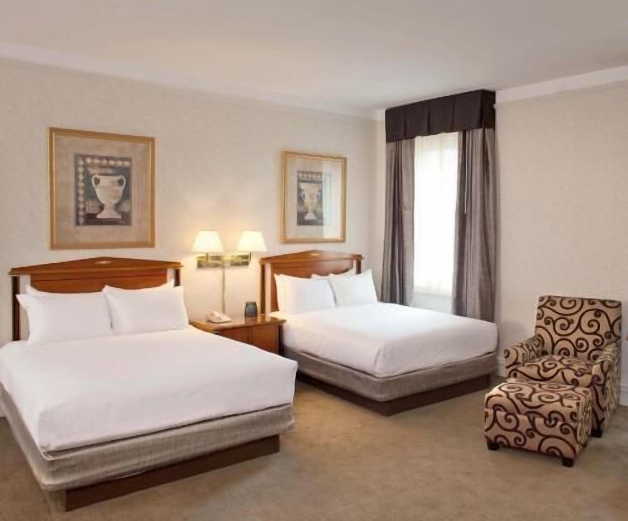 Premium bedding, pillow-top beds, in-room safe, desk
