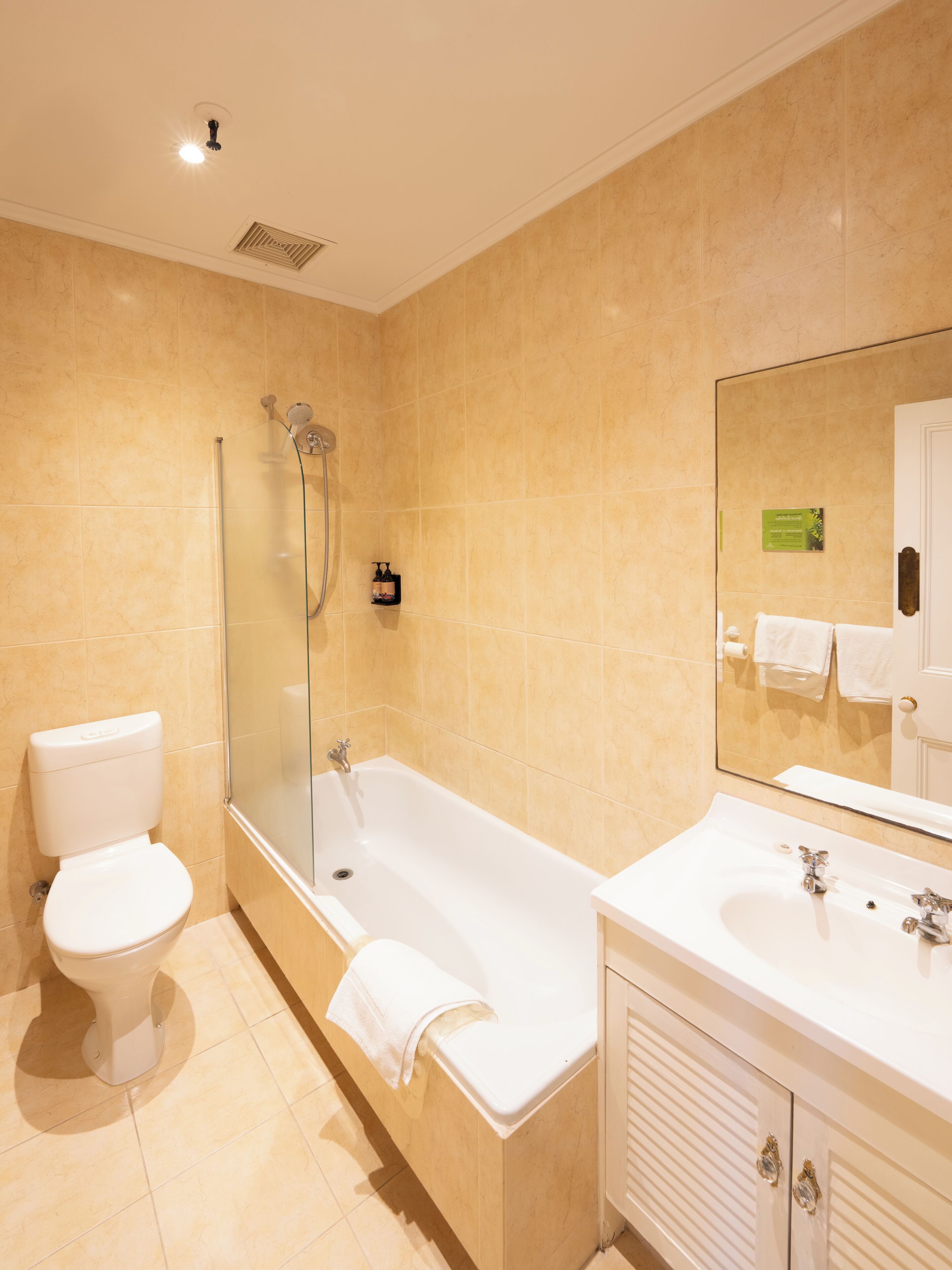 designer room | bathroom | designer toiletries, hair dryer, bathrobes, towels