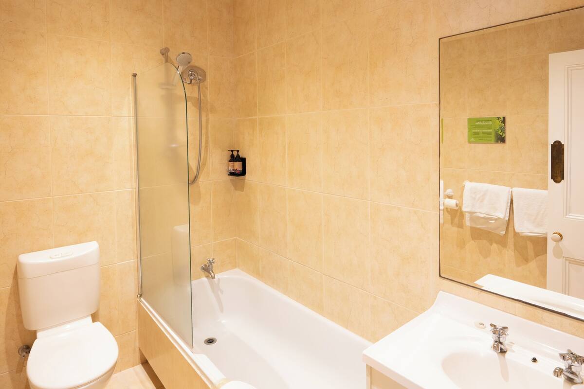 designer room | bathroom | designer toiletries, hair dryer, bathrobes, towels